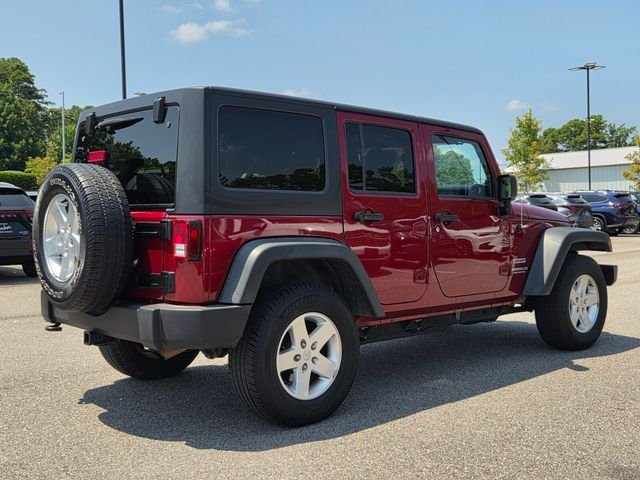 Used 2013 Red Jeep Unlimited Sport image 5