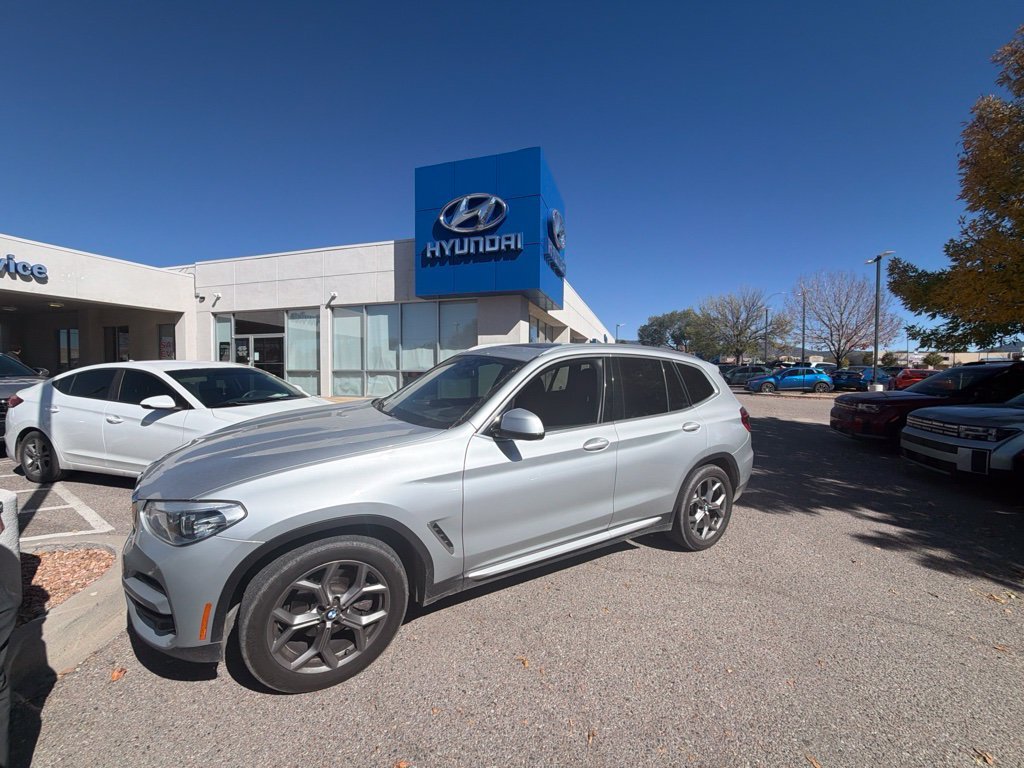 Used 2021 Silver BMW xDrive30i image 1