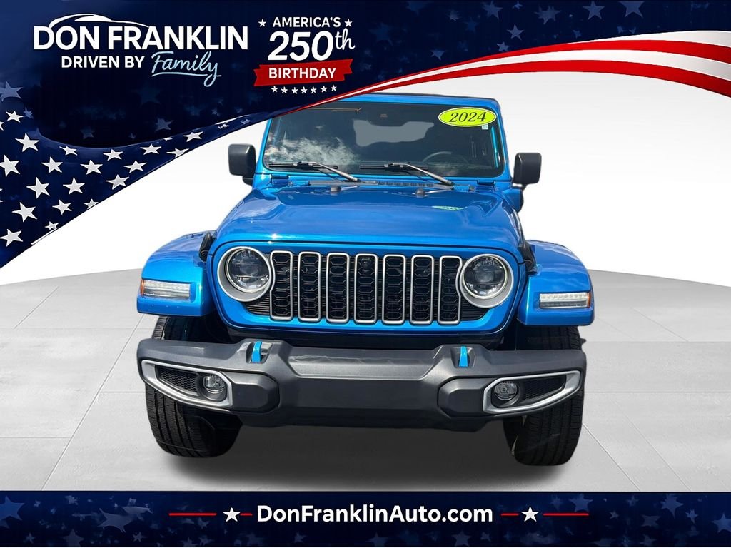 Used 2024 Blue Jeep Sahara 4xe image 1