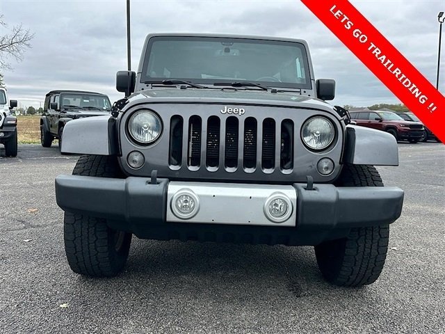 Used 2014 Jeep Wrangler Unlimited Sahara with VIN 1C4BJWEG0EL207217 for sale in New Carlisle, OH