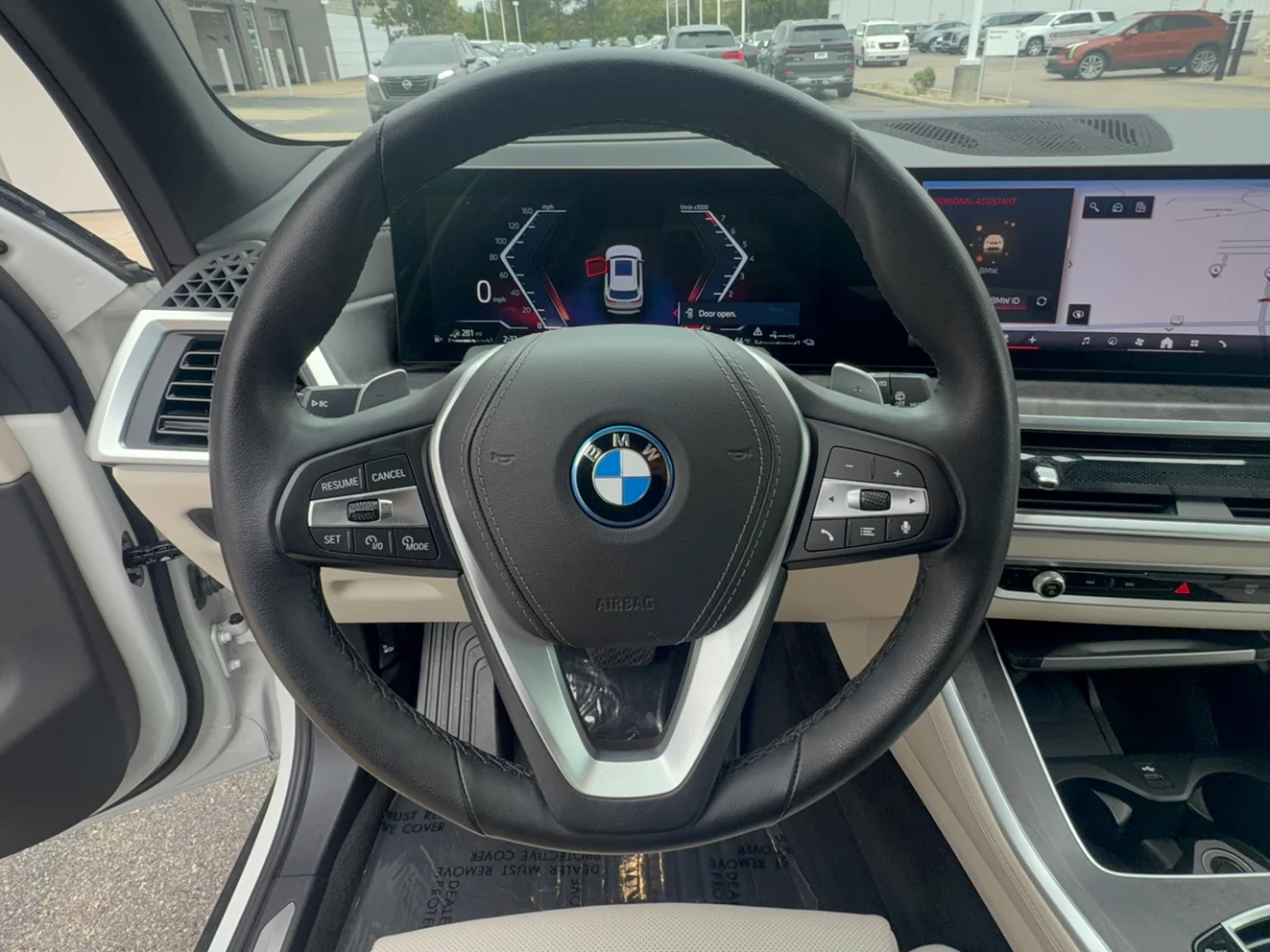 Certified Used 2024 Mineral White Metallic BMW xDrive50e image 14
