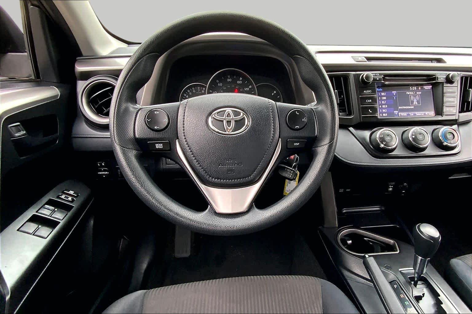 Used 2016 Magnetic Gray Metallic Toyota LE image 6