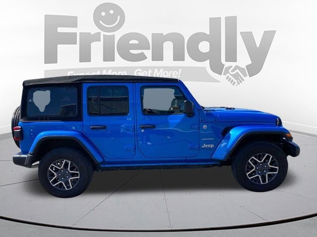 Used 2024 Blue Jeep Sahara image 4
