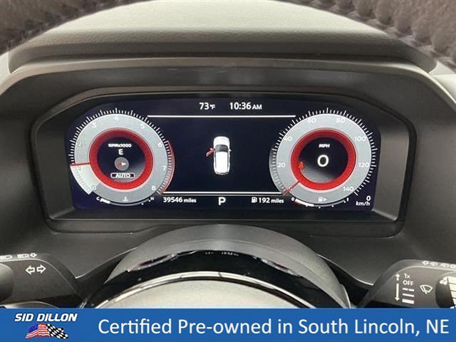 Used 2024 Champagne Silver Metallic Nissan Platinum image 11