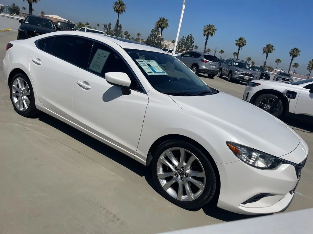 2015 Mazda EZ-6 i Touring Auto's photo
