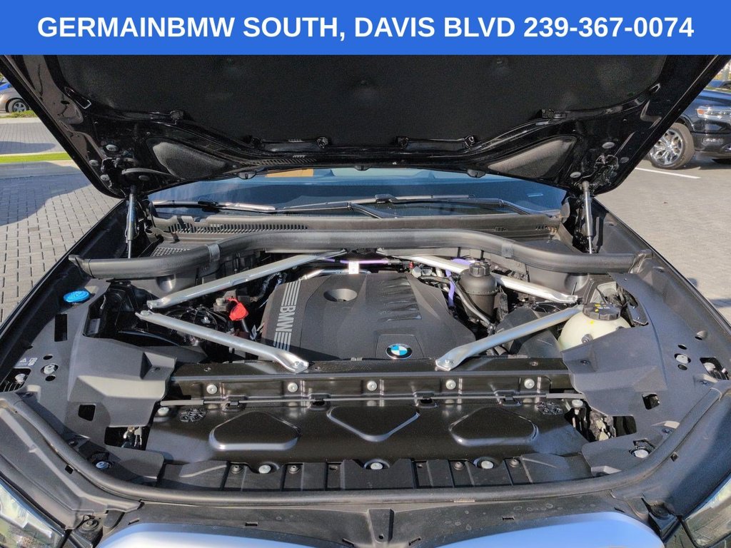 Certified Used 2024 Black Sapphire Metallic BMW sDrive40i image 14