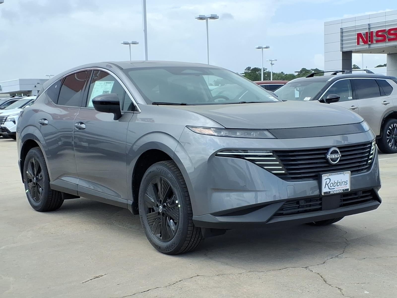 New 2026 Gun Metallic Nissan SV image 3
