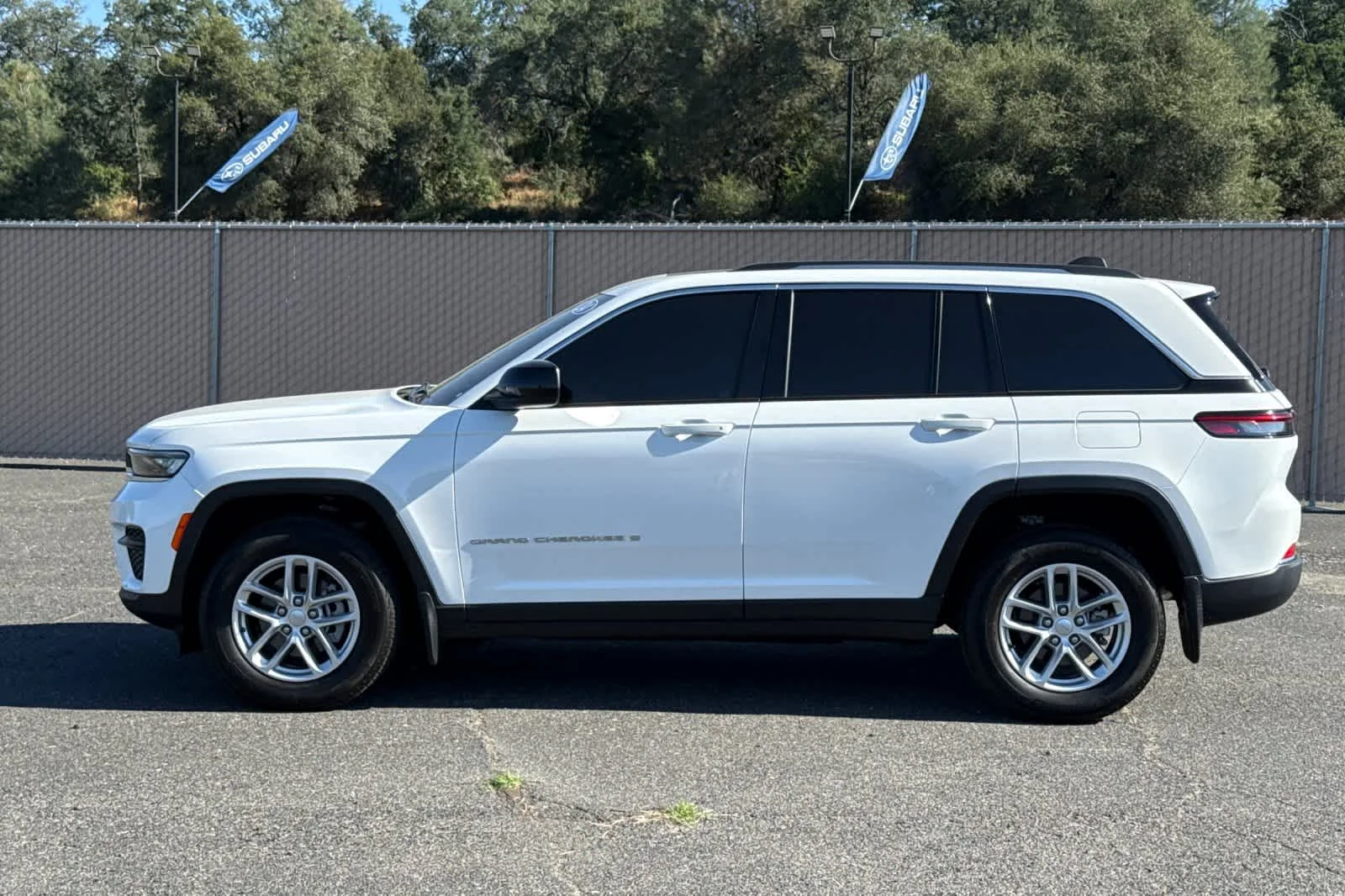 Used 2024 Bright White Clearcoat Jeep Laredo X image 6