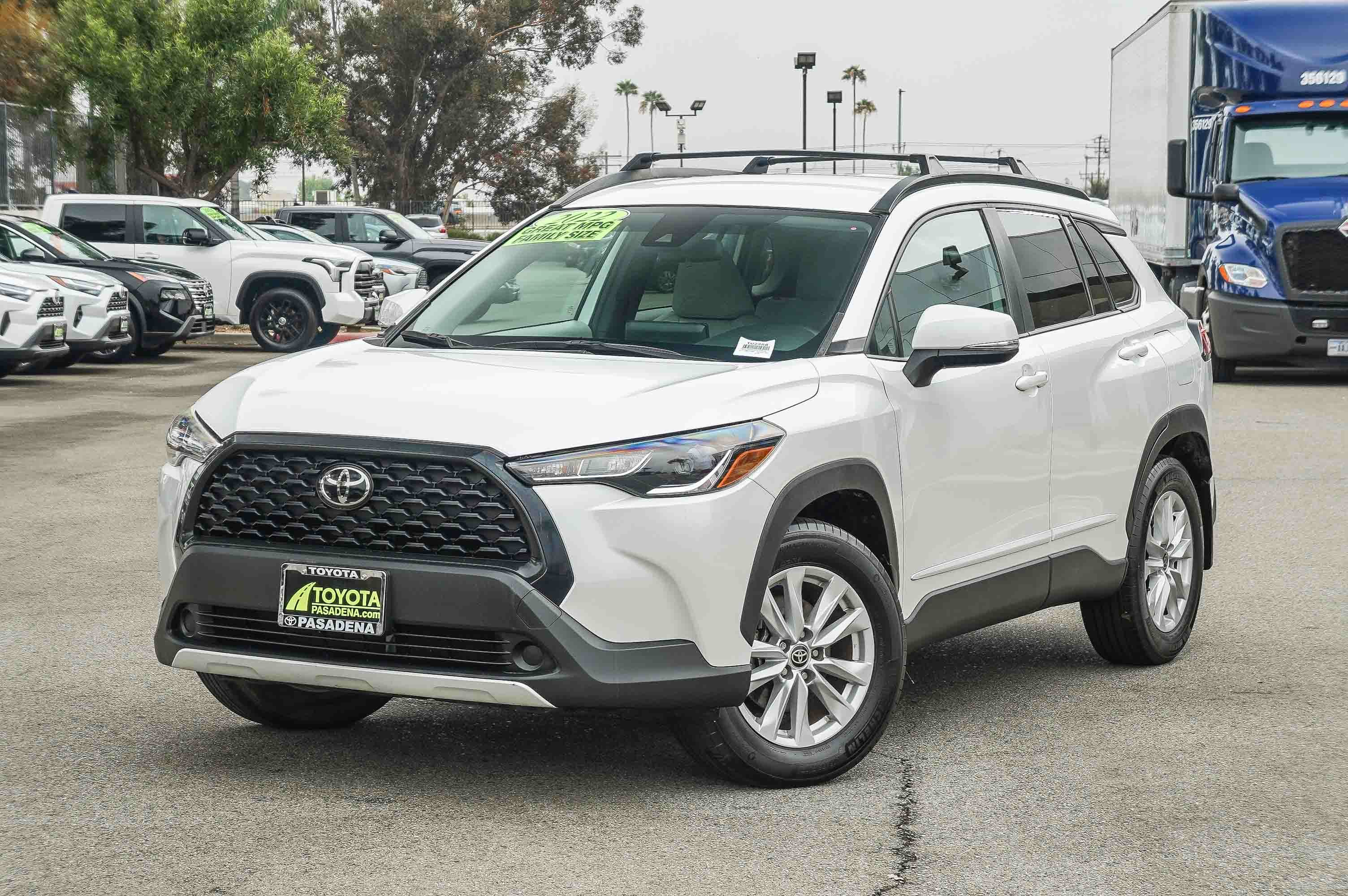 Used 2022 WIND CHILL PEARL TOYOTA TRUCK LE image 1