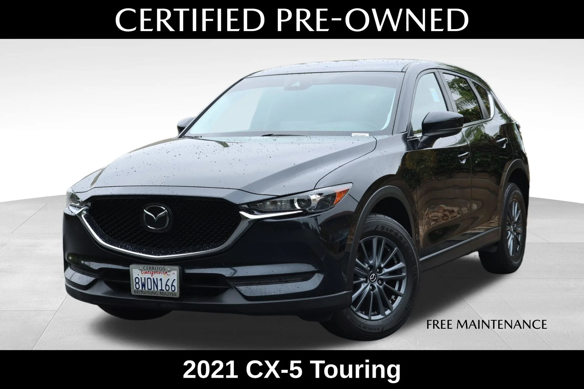 Certified Used 2021 Black Mazda Touring image 1
