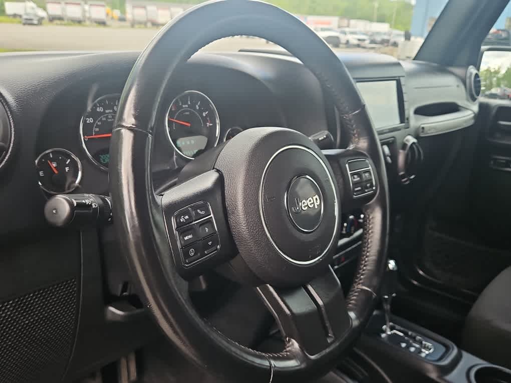 Used 2018 Granite Crystal Metallic Clearcoat Jeep Sport S image 14