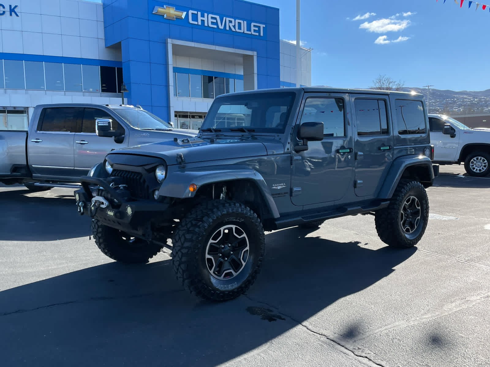 Used 2015 Jeep Wrangler Unlimited Sahara with VIN 1C4BJWEG6FL583762 for sale in Woods Cross, UT