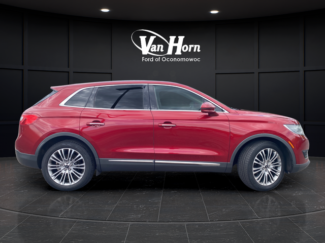 Used 2016 Ruby Red Metallic Lincoln Reserve image 8