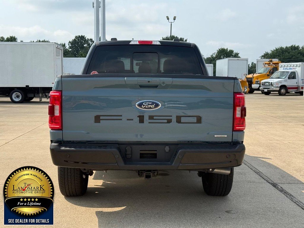 Used 2023 Area 51 Blue Ford XLT 4WD SuperCrew 6.5