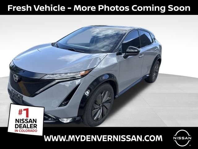Certified Used 2024 Gray Nissan EVOLVE+ e-4ORCE image 1