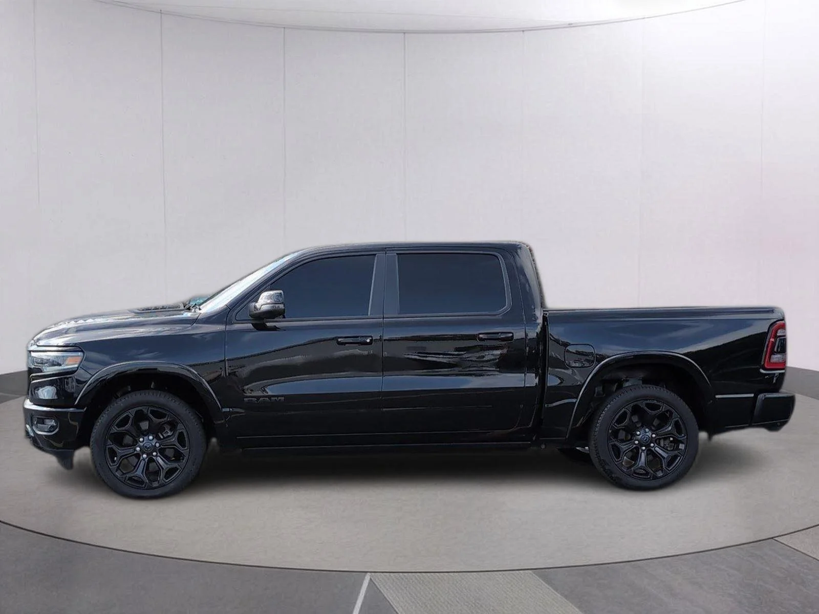 Used 2023 Diamond Black Crystal Pearlcoat Ram Limited image 2