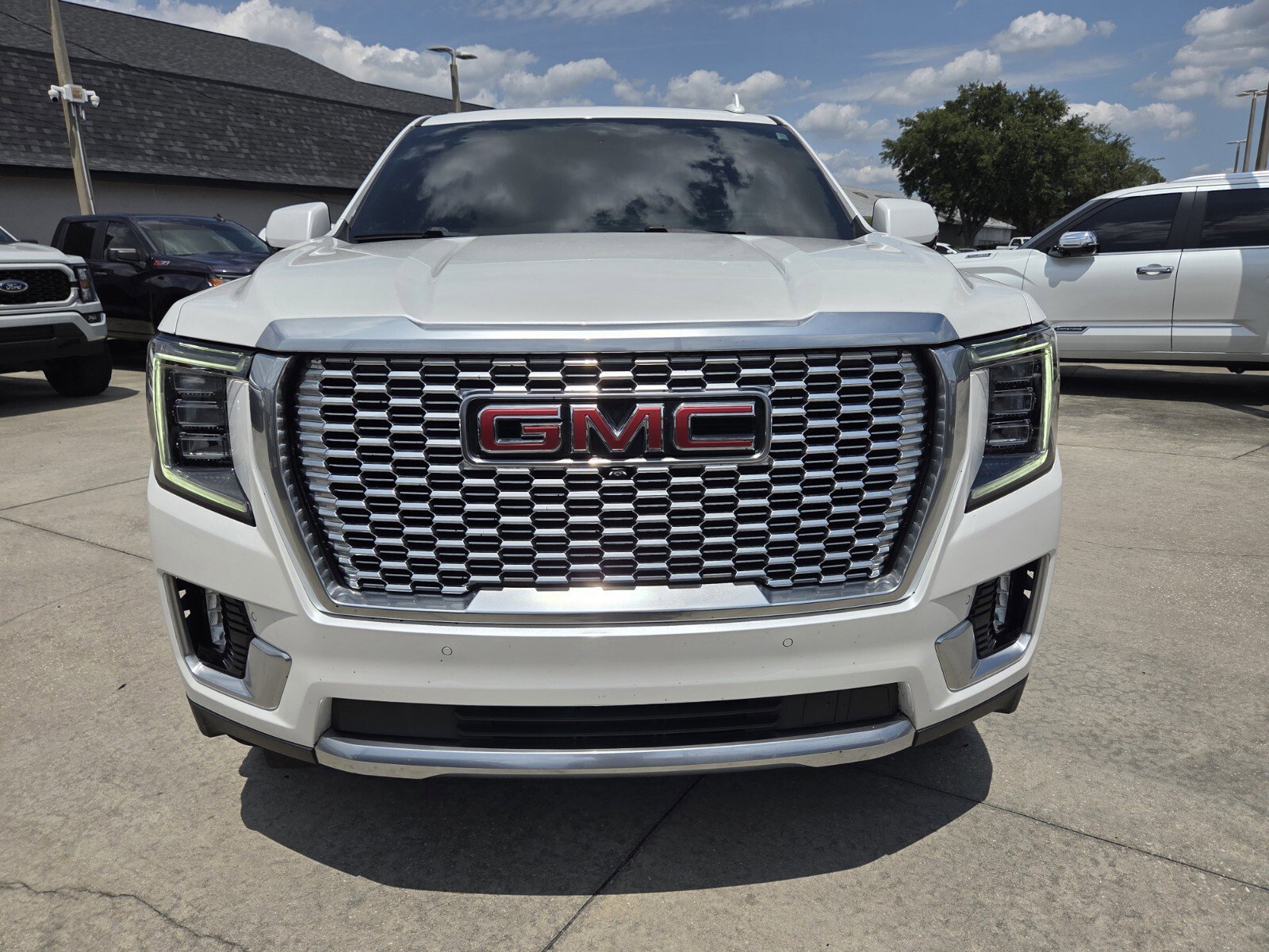 Used 2024 White Frost Tricoat GMC Denali image 1