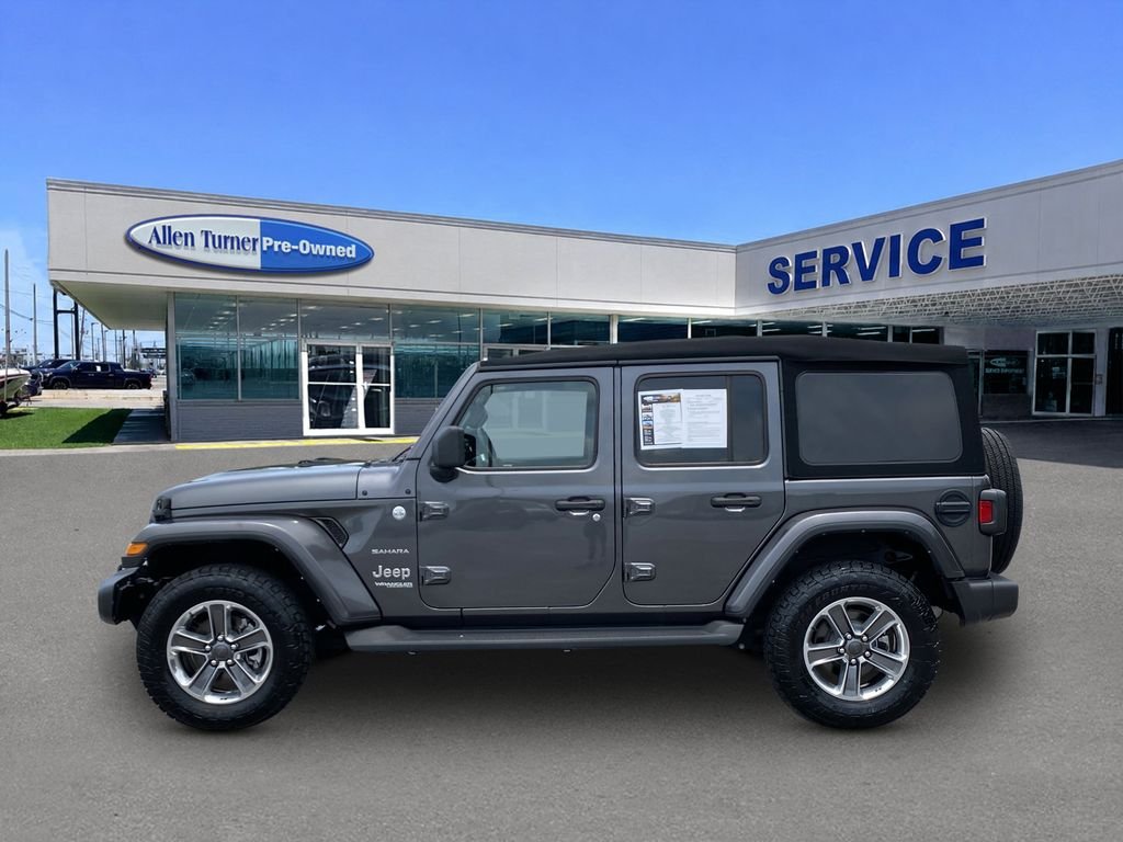 Used 2022 Granite Crystal Metallic Clearcoat Jeep Unlimited Sahara image 5