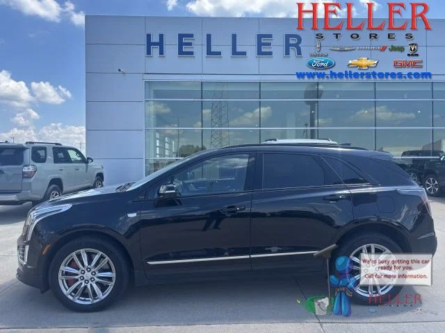 Used 2024 Black Cadillac Sport image 1