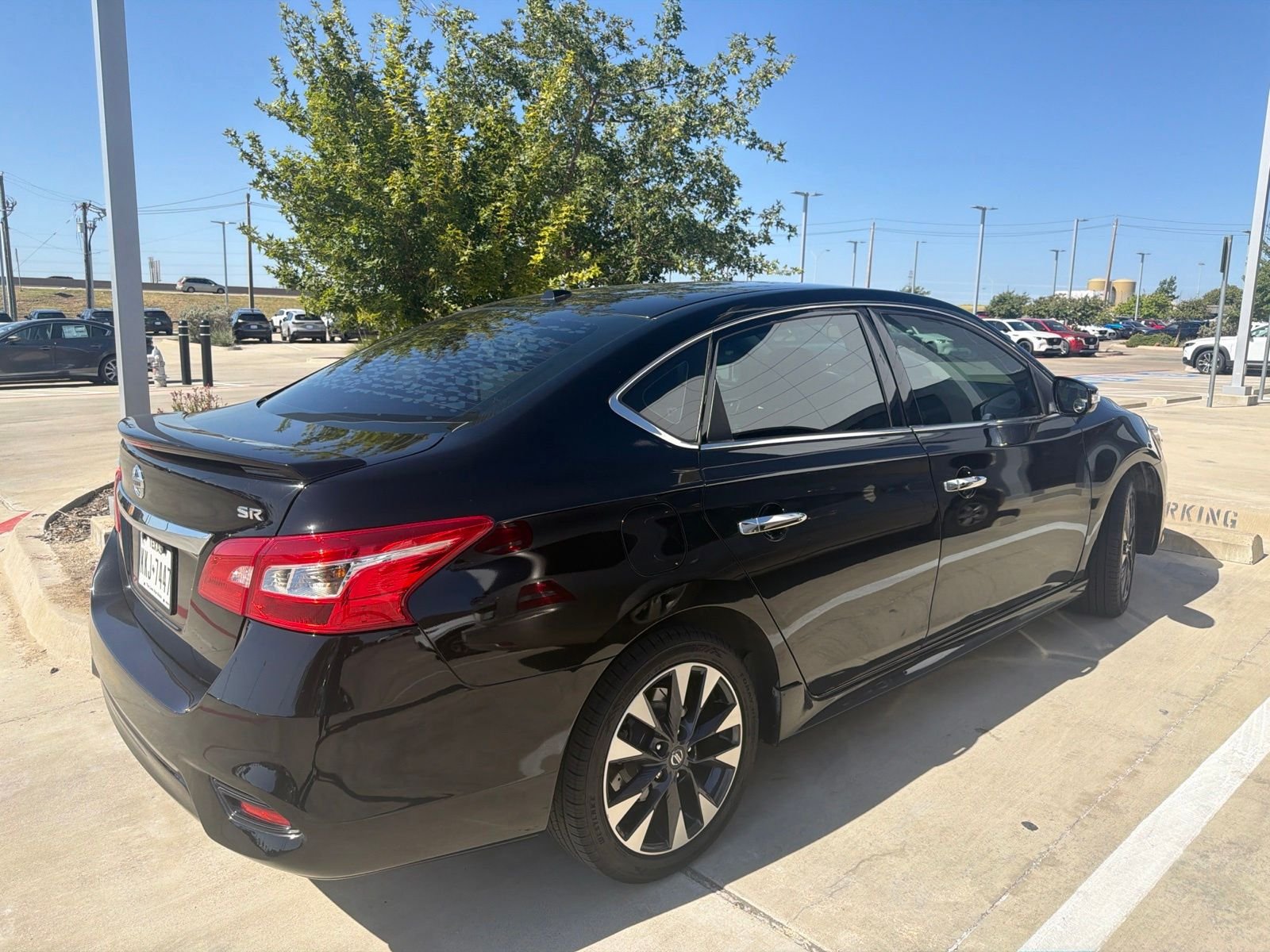 Used 2017 Super Black Nissan SR image 8