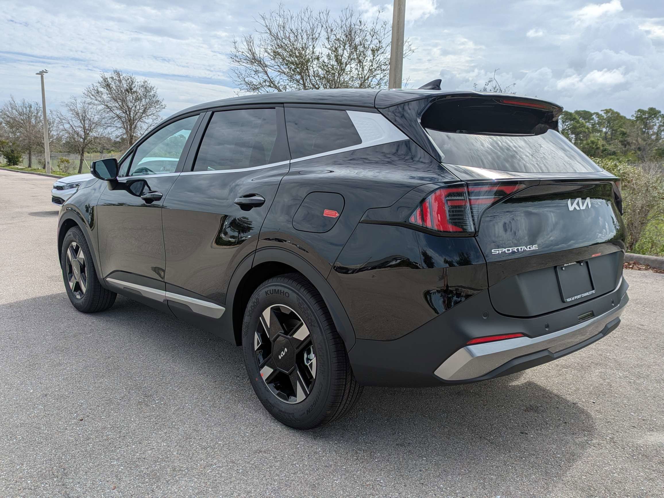 New 2026 Ebony Black Kia LX image 7