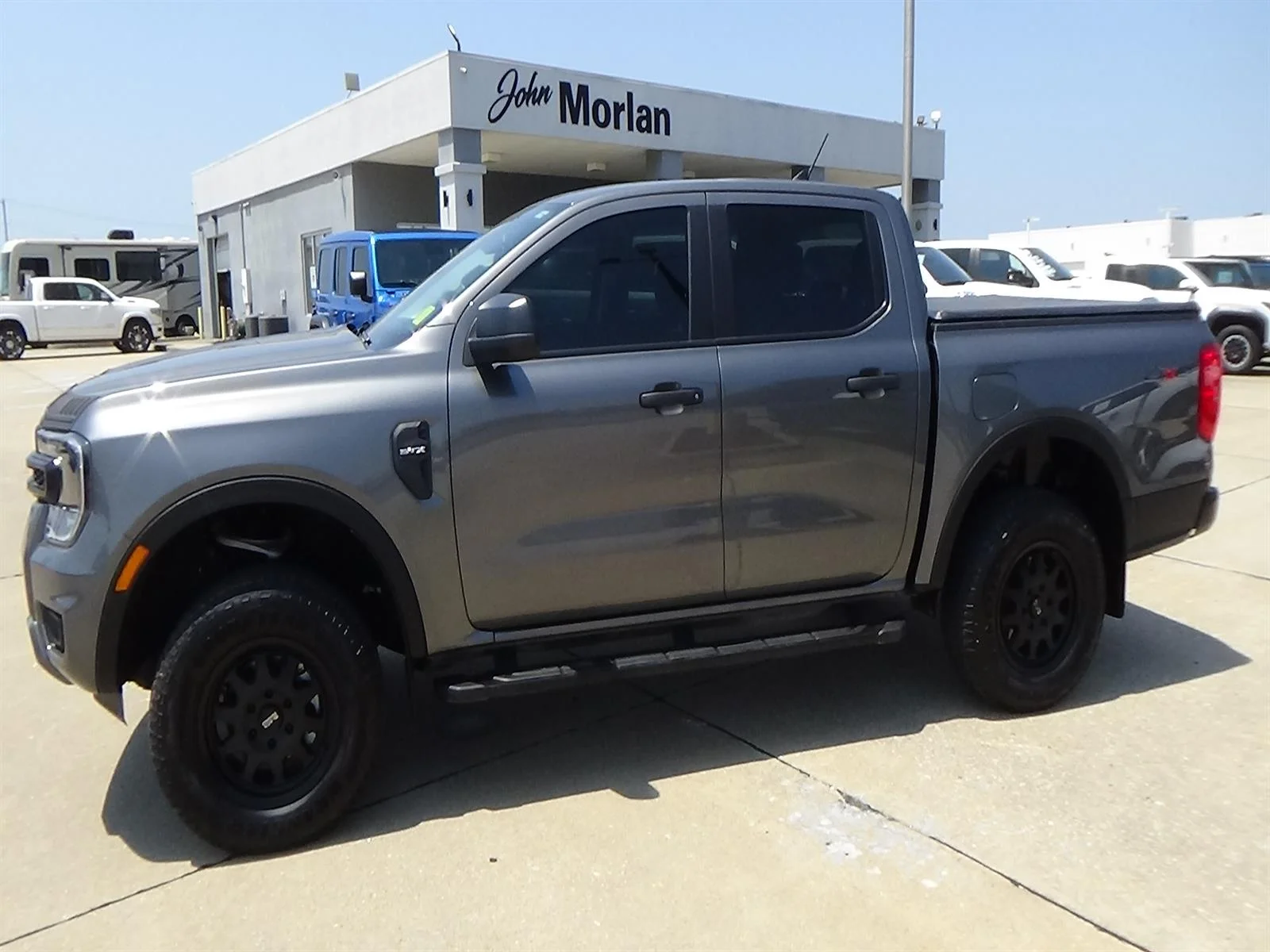 Used 2024 Carbonized Gray Ford STX image 1