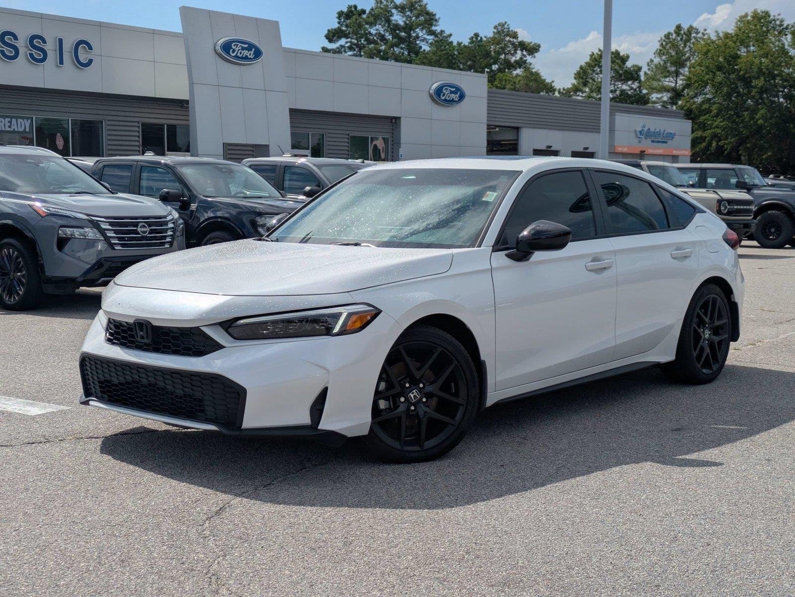 Used 2025 Platinum White Pearl Honda Sport image 1