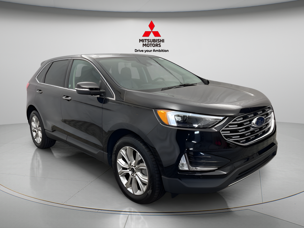 Used 2024 Black Metallic Ford Titanium AWD image 2