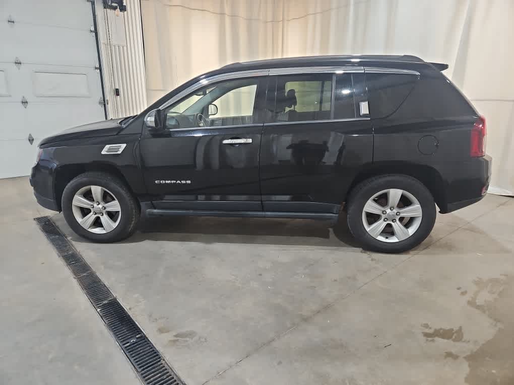 Used 2015 Black Clearcoat Jeep High Altitude Edition image 2
