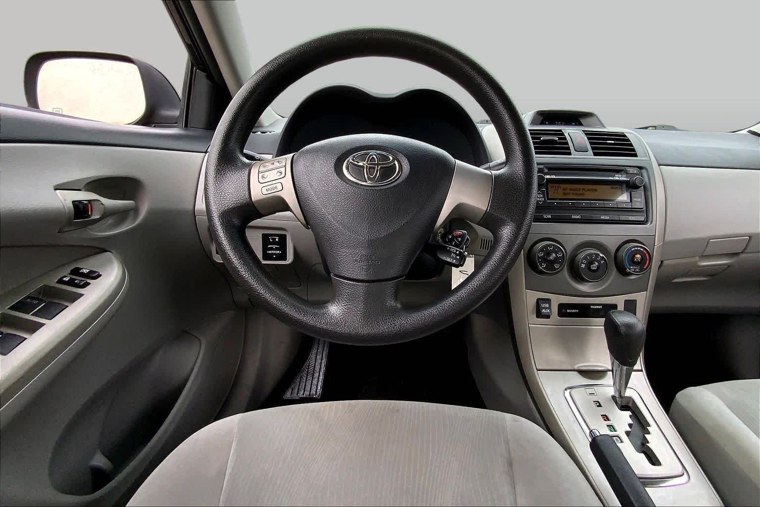 Used 2012 Black Sand Pearl Toyota LE image 6