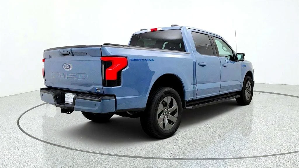 Used 2023 Azure Gray Metallic Tri-Coat Ford XLT 4WD SuperCrew 5.5