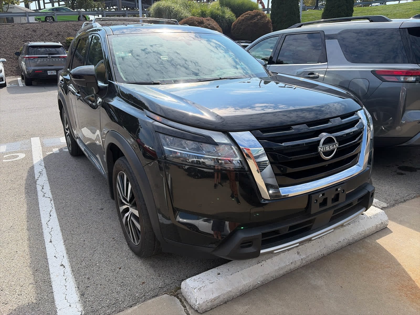 Certified Used 2024 Super Black Nissan Platinum image 2