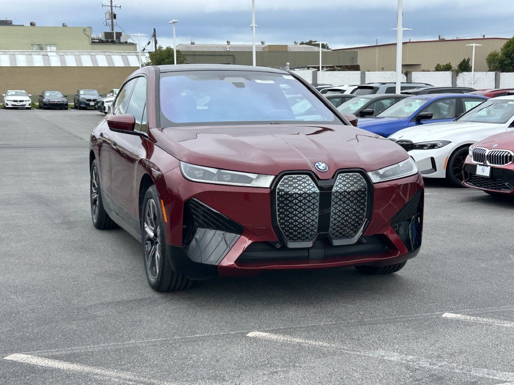 Certified Used 2024 Red Metallic BMW xDrive50 image 7