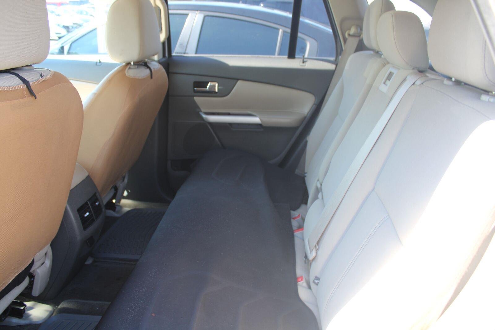 Used 2012 White Suede Ford SE image 7