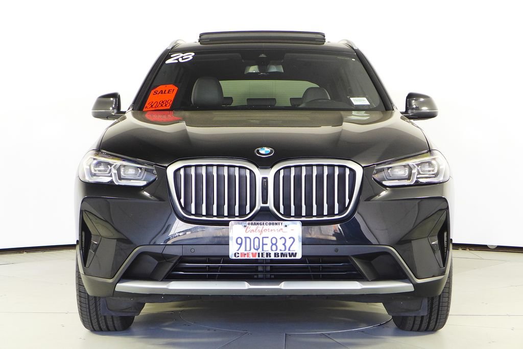 Used 2023 Black Sapphire Metallic BMW sDrive30i image 3