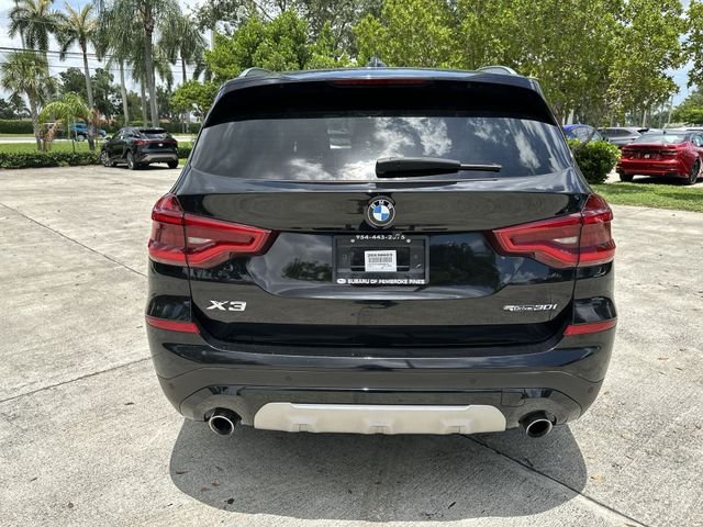 Used 2021 Black BMW sDrive30i image 24