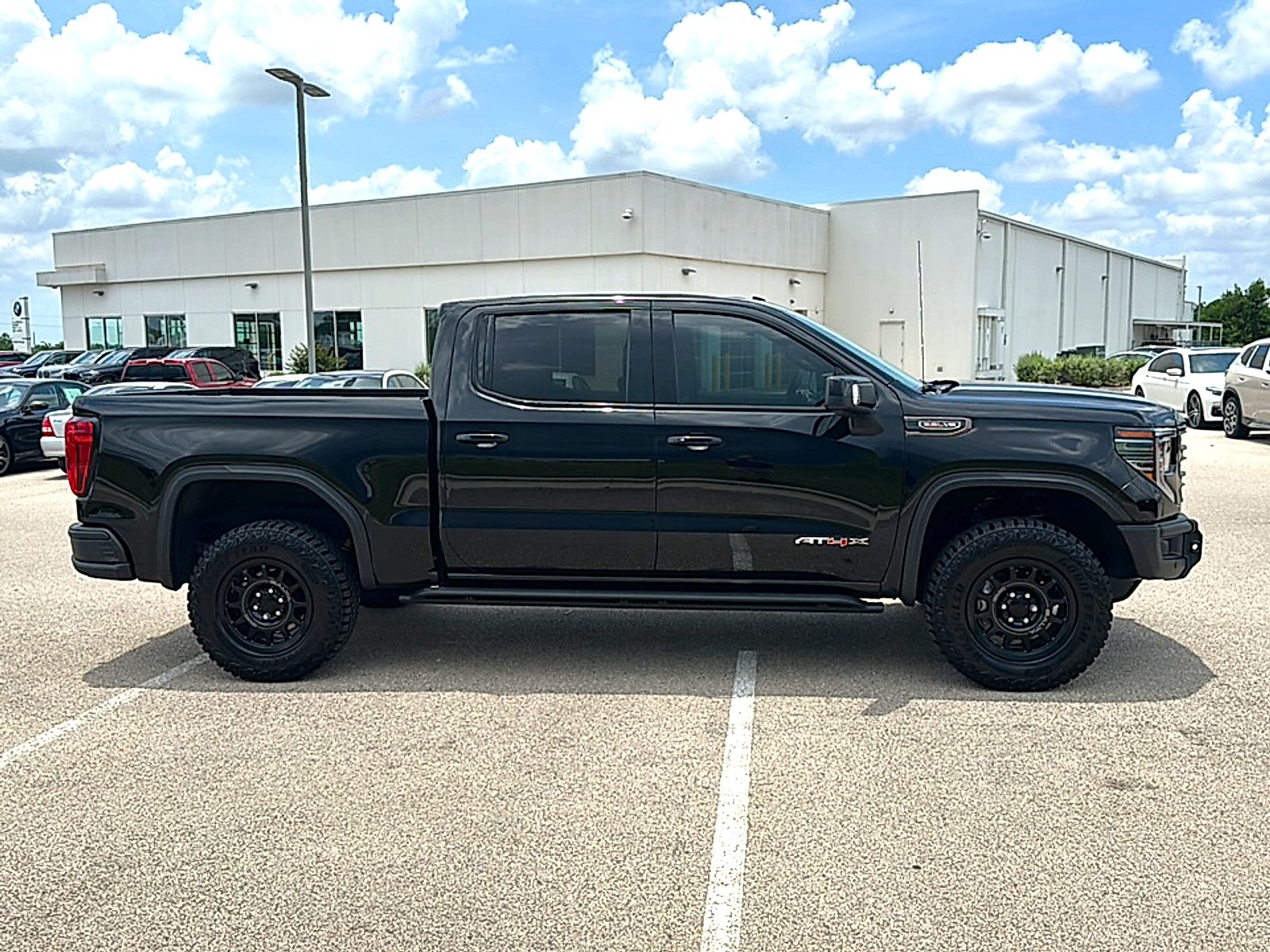 Used 2026 Onyx Black GMC Crew Cab, Short Bed, AT4X, 4WD image 9