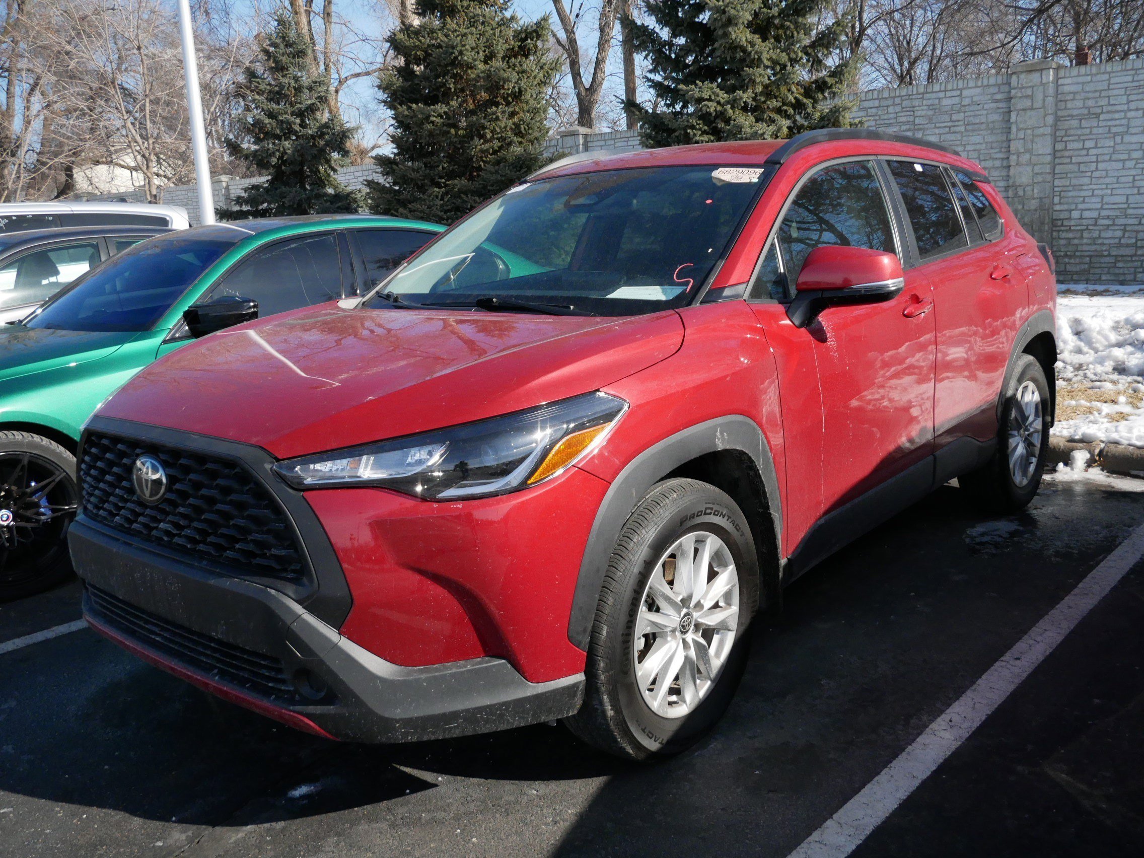 Certified 2023 Toyota Corolla Cross LE with VIN 7MUCAABG0PV044958 for sale in Brooklyn Center, Minnesota