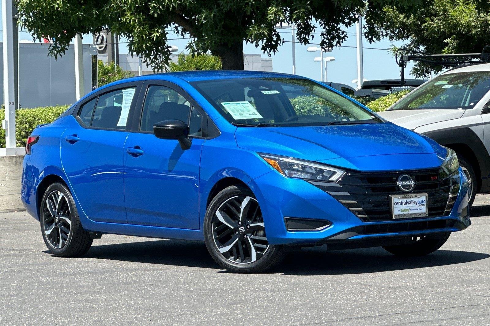 Used 2024 Electric Blue Metallic Nissan SR image 2