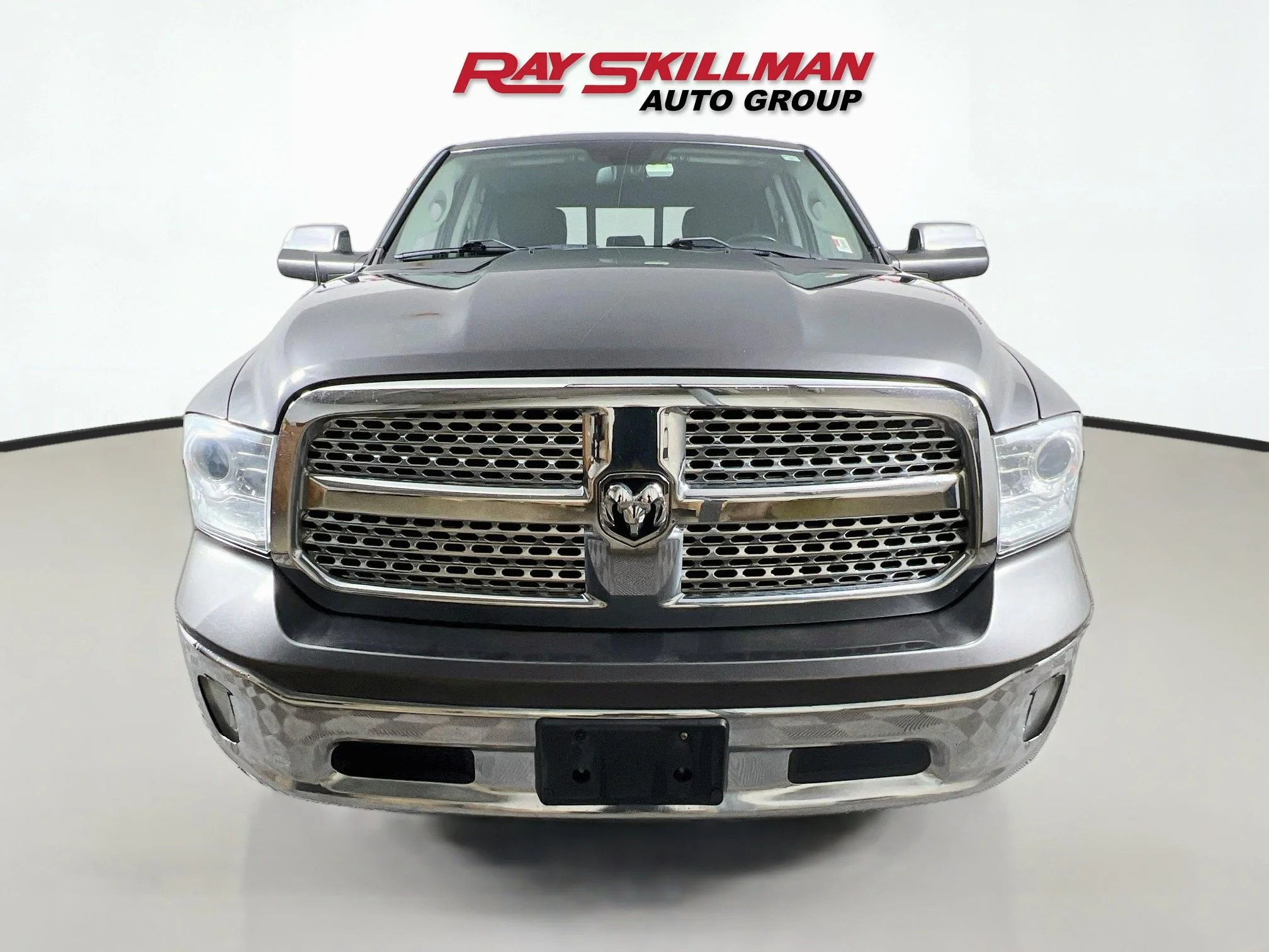 Used 2016 Granite Crystal Metallic Clearcoat Ram LARAMIE image 2