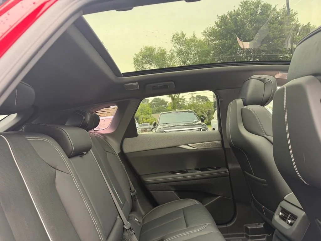 Used 2025 Radiant Red Tintcoat Cadillac Sport 2 image 14