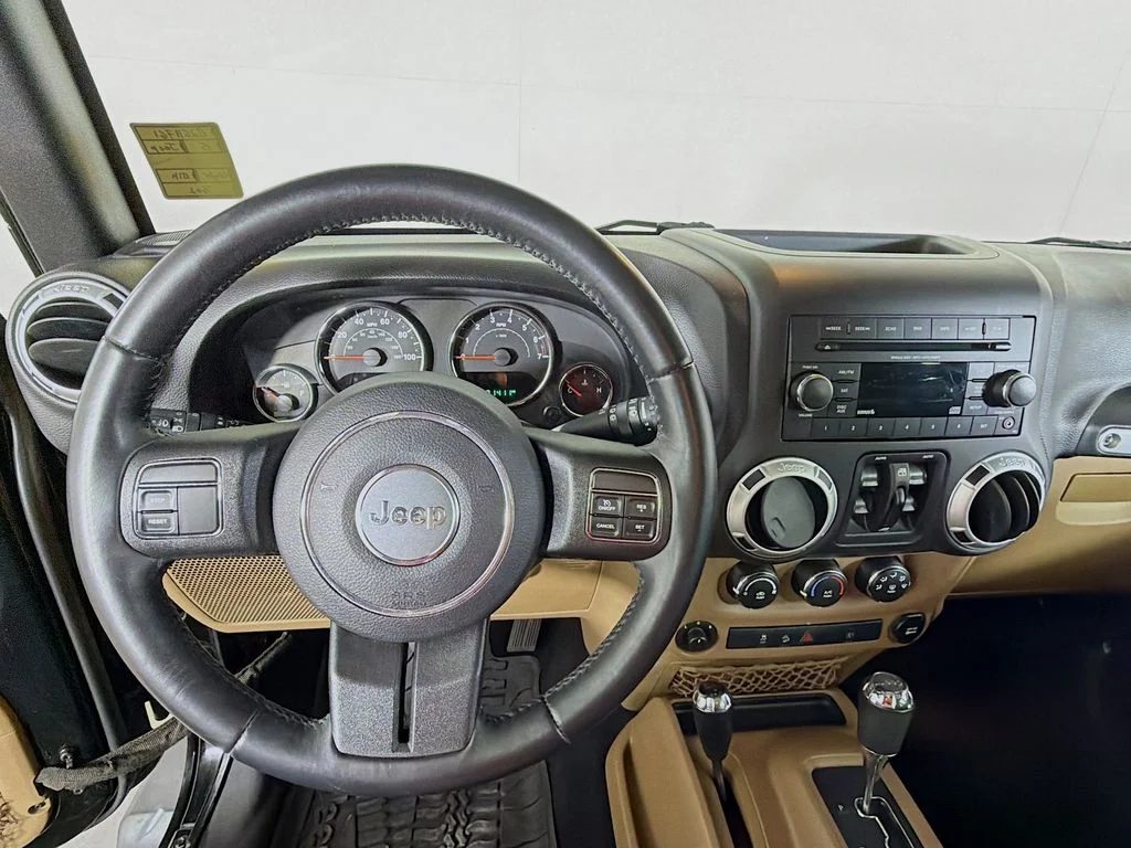Used 2015 Black Jeep Unlimited Sahara image 12