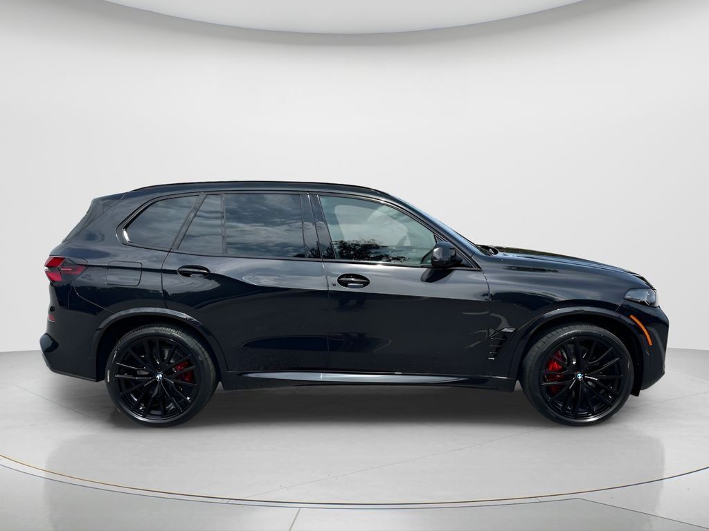 New 2026 Black Sapphire Metallic BMW xDrive40i image 4