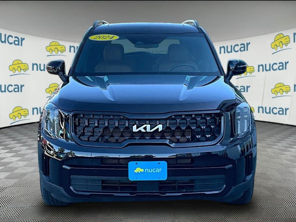 Used 2024 Ebony Black Kia EX X-Line image 2