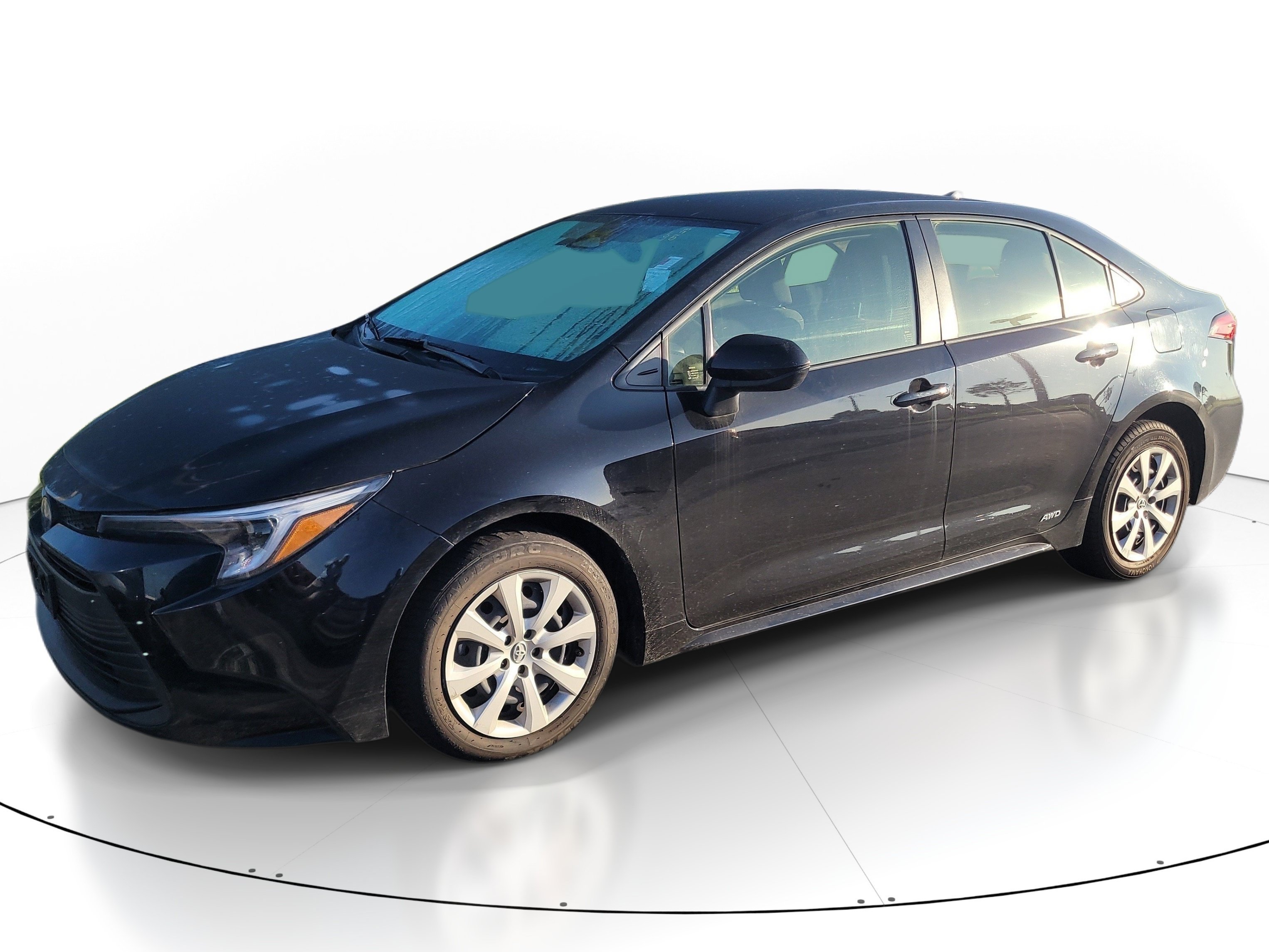 Used 2023 Midnight Black Metallic Toyota Hybrid LE image 3