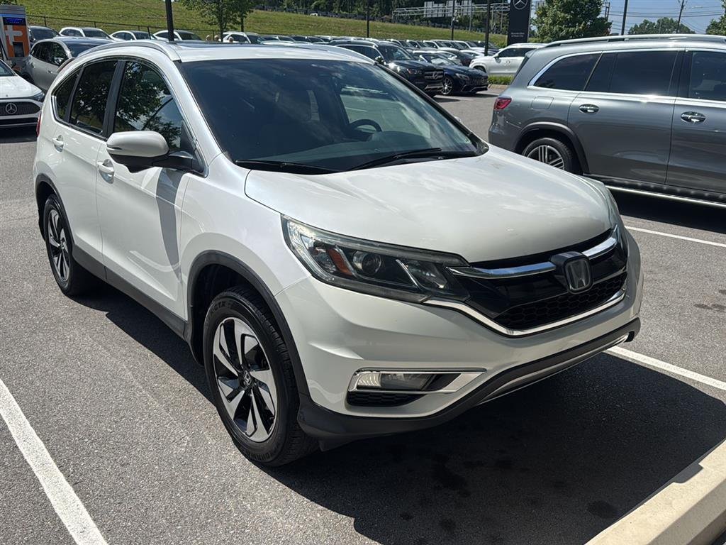 Used 2015 White Diamond Pearl Honda Touring image 1