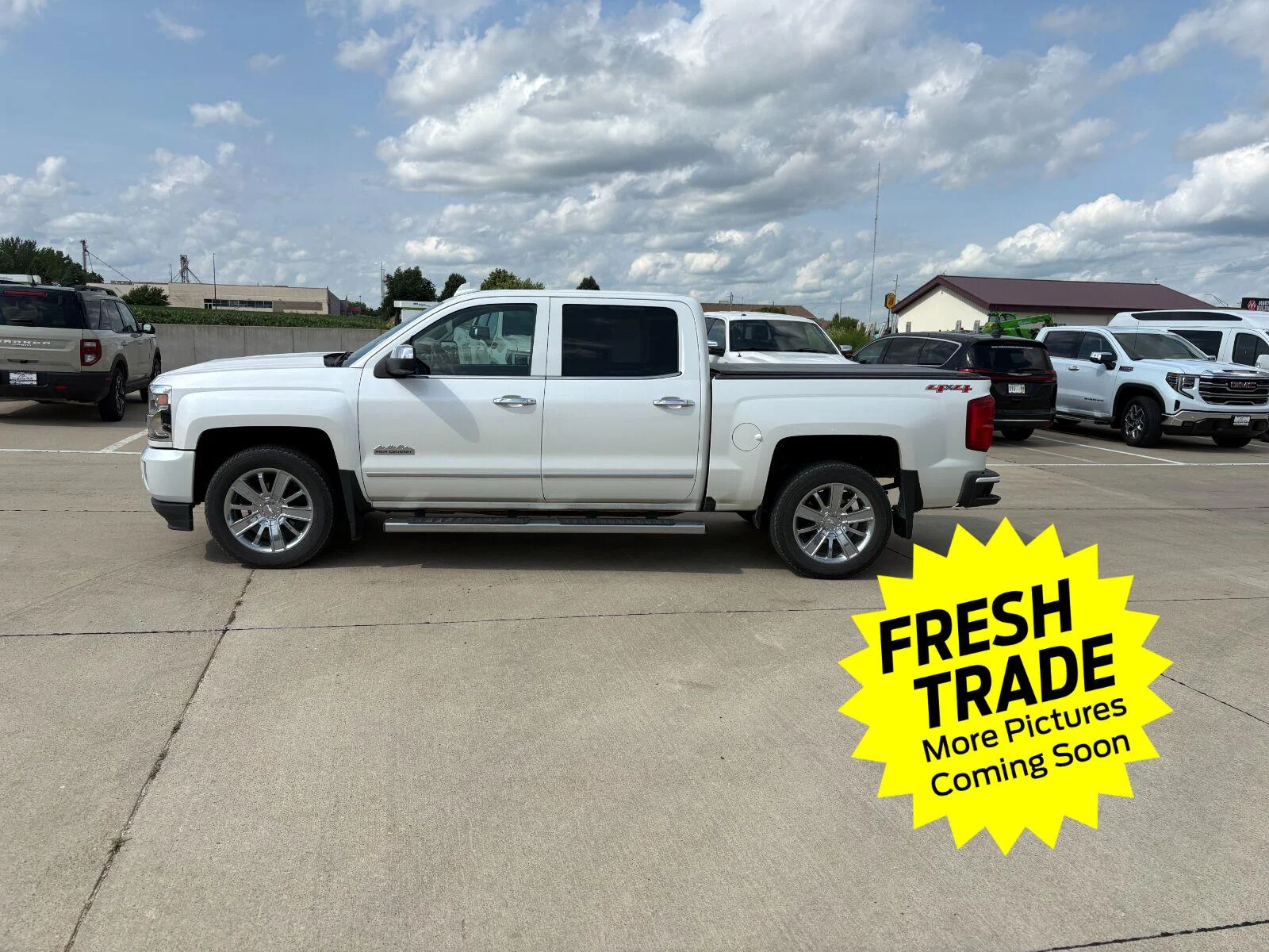 Used 2017 IRIDESCENT PEARL TRICOAT Chevrolet High Country image 1