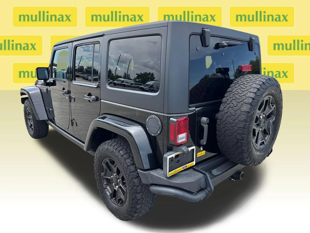 Used 2016 Black Jeep Unlimited Sahara image 6