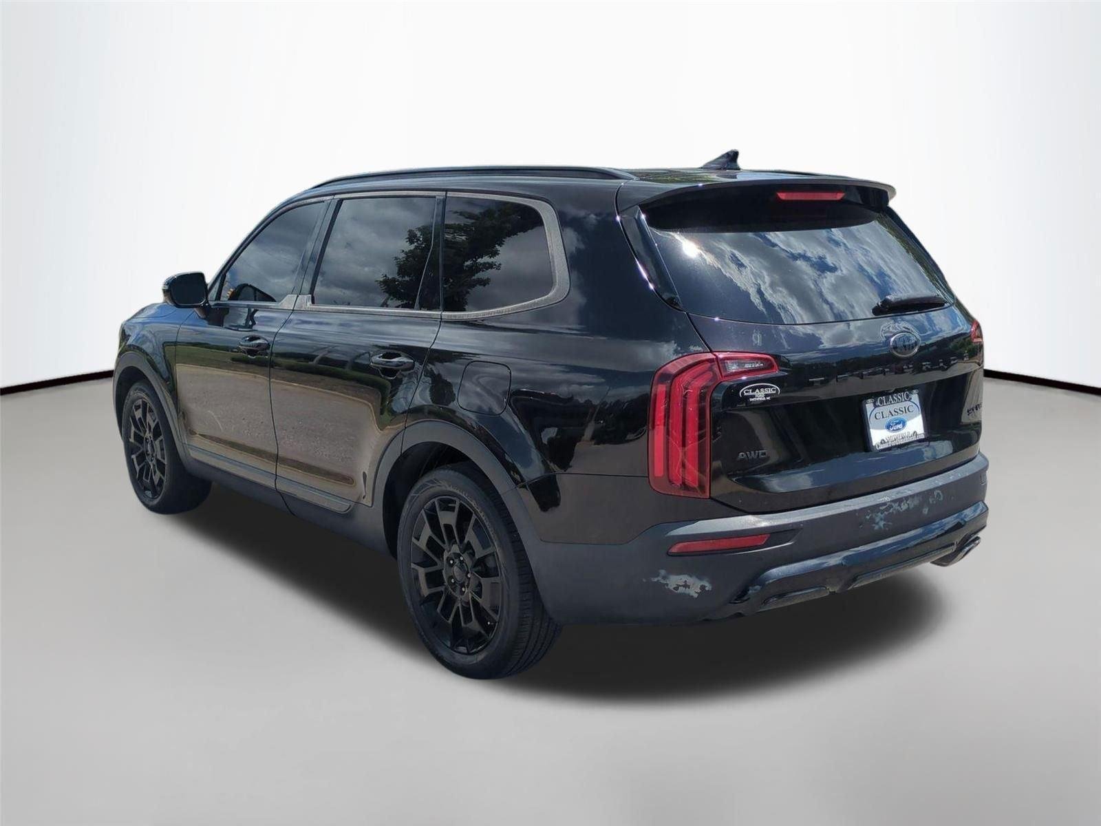 Used 2021 Black Copper Kia SX image 3