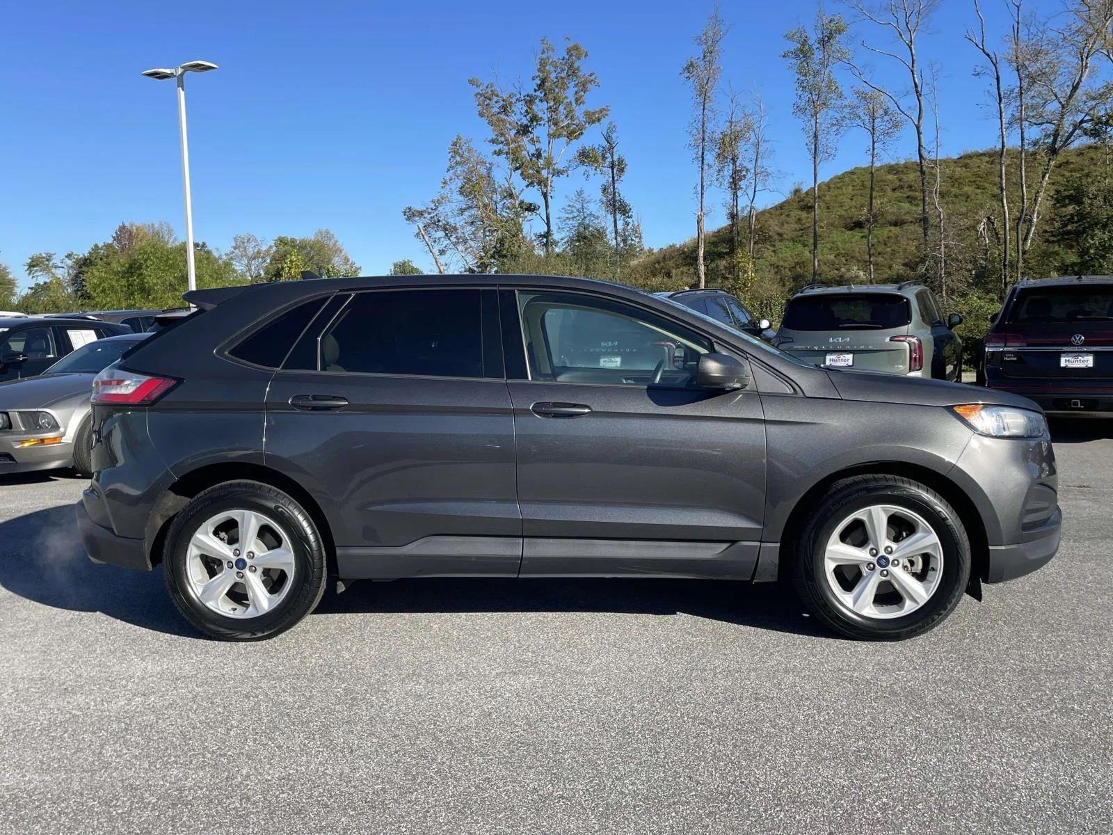 Used 2020 Magnetic Metallic Ford SE image 29